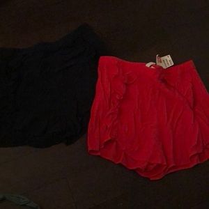 Two for price of one! Ruffle shorts never worn